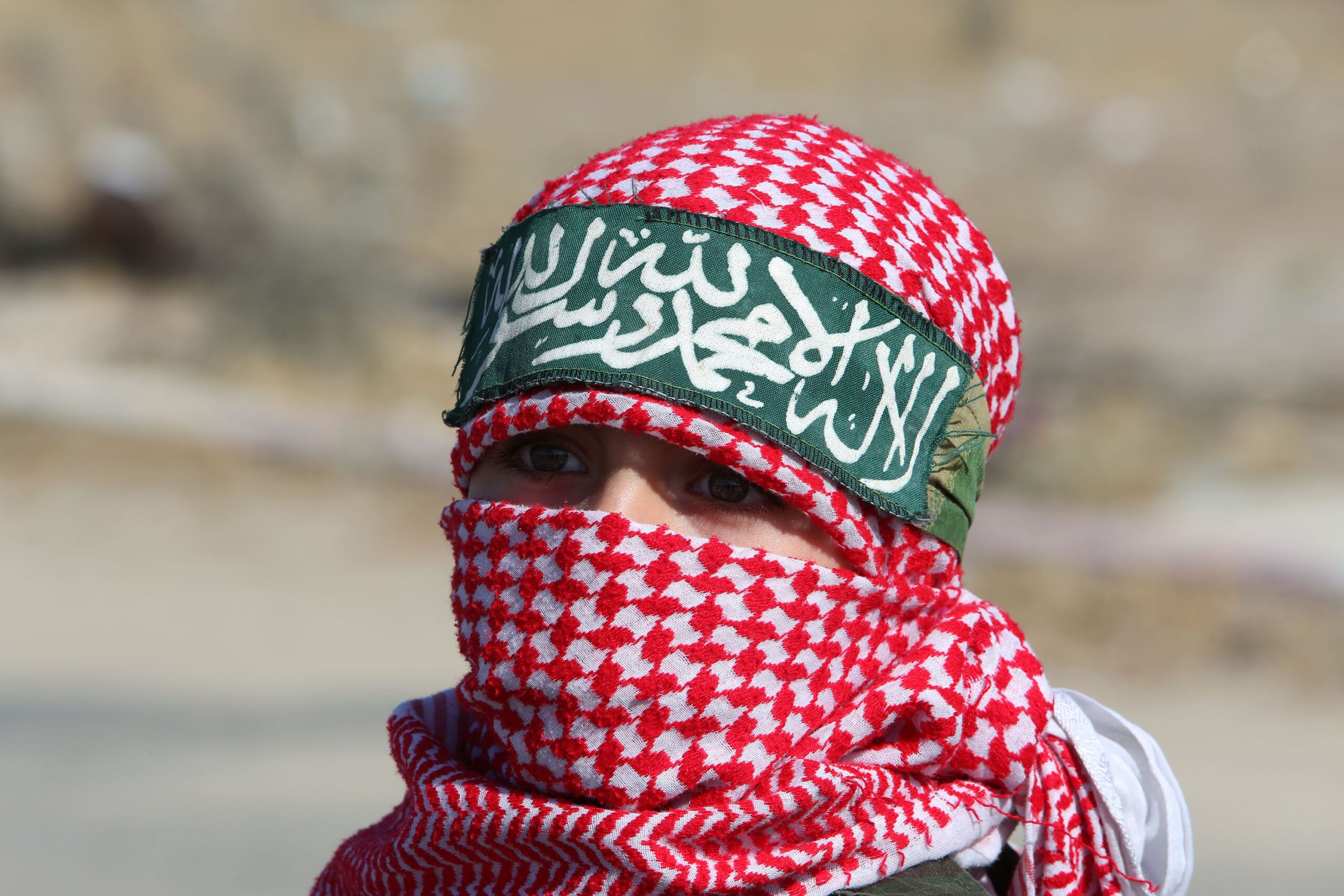 Palestinian supporters of the Ezz-Al Din Al-Qassam Brigades, the armed wing of the Hamas movement